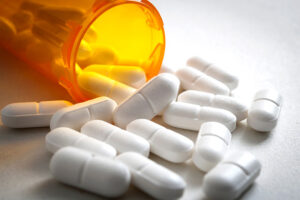 A close-up image of painkillers, which can be addictive and lead to painkiller addiction.