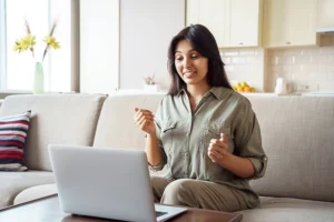 A person participates in a virtual AA meeting.