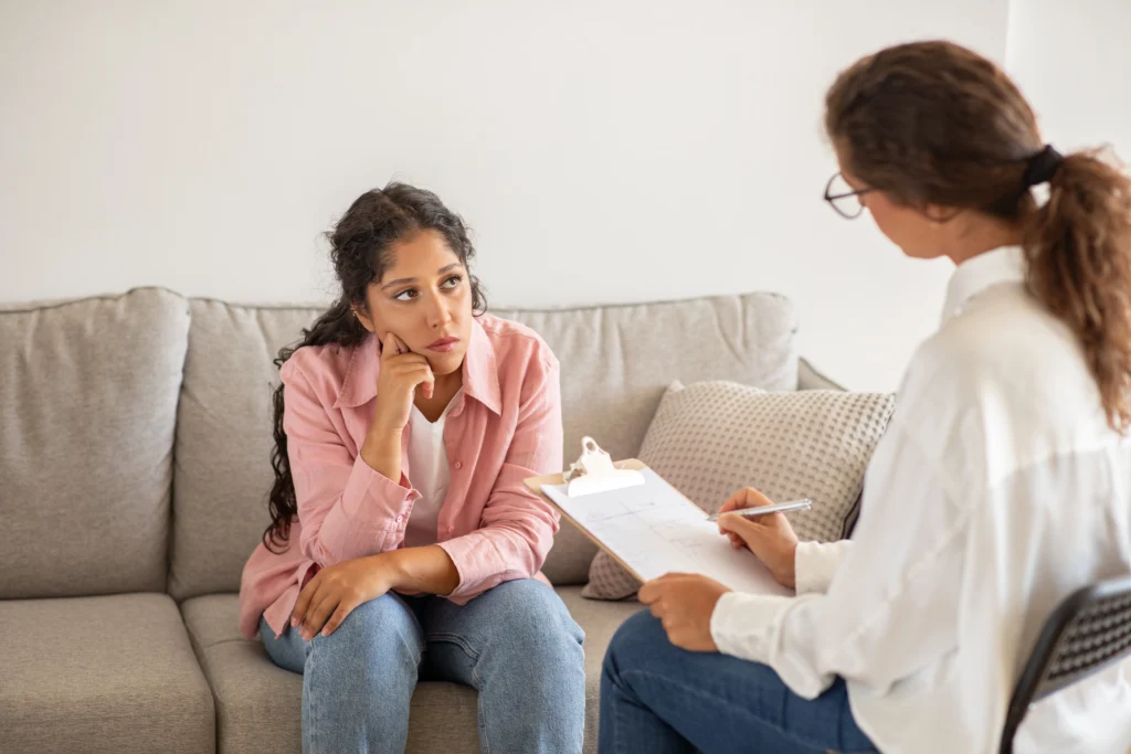 A person participates in therapy while in inpatient treatment for addiction.