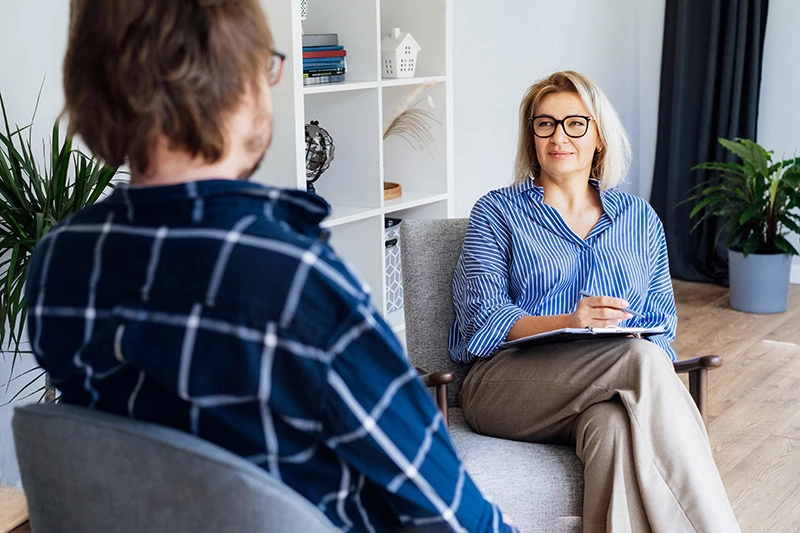 A person participates in intensive outpatient therapy.