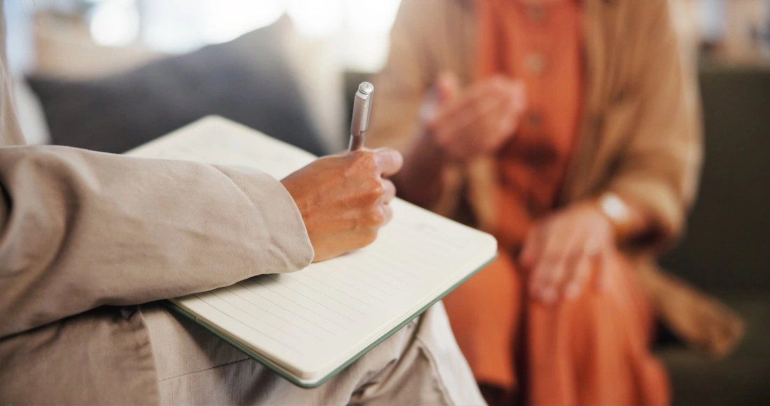 A provider discusses the difference between outpatient and inpatient treatment with a client.
